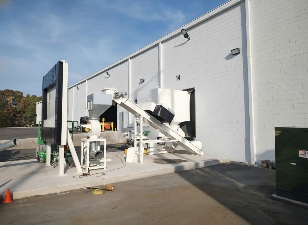 Cresswood wood grinder installed by Boulware Equipment at pallet recycler facility in Richmond, Virginia