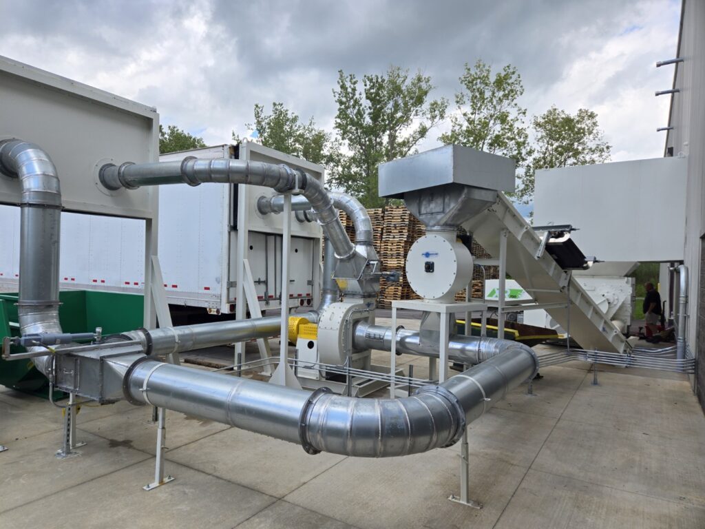 High-volume pallet scrap grinder system in Buffalo