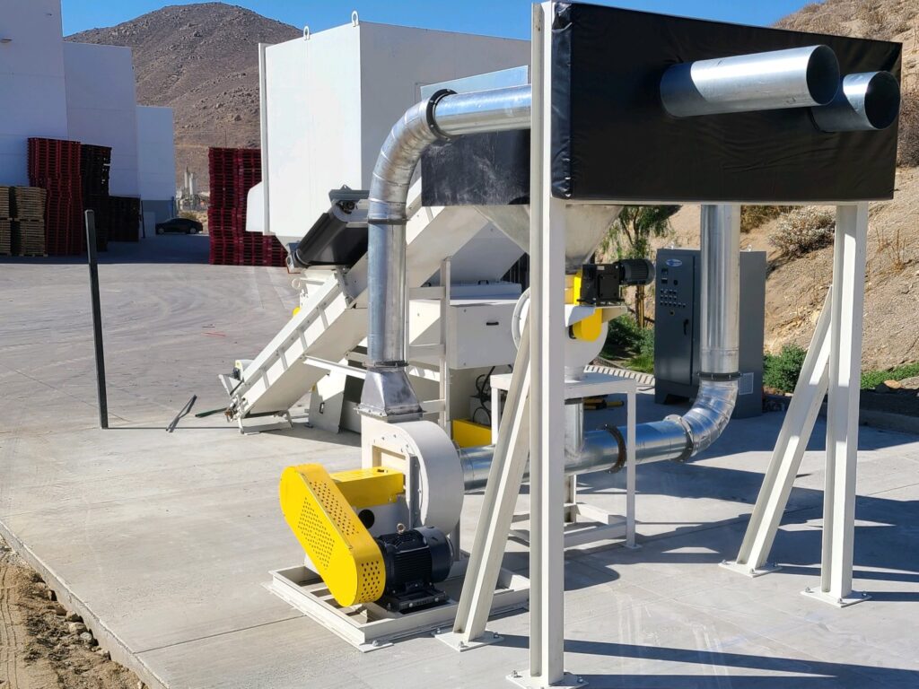 Conveyor system integrated with Cresswood grinder